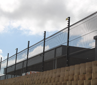 Large Scale Electric Fence on Property Boundary